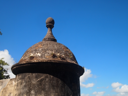 a turreted guard tower, called a garita,  with its distinctive conical structure