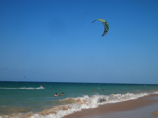 kiteboarders at the beach